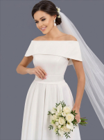 Длинное свадебное платье белого цвета с открытыми плечами и поясом-бантом — изображение 4