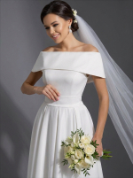 Длинное свадебное платье белого цвета с открытыми плечами и поясом-бантом — изображение 7