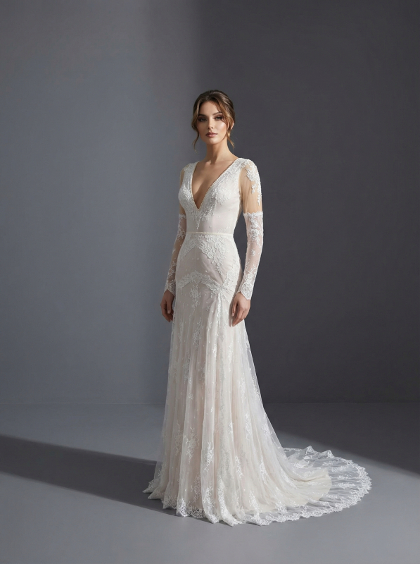 Утонченное свадебное платье в стиле современной классики или бохо-шик с лифом из полупрозрачной ткани и длинными иллюзорными рукавами