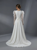 Классический А-силуэт с акцентированной талией, плавно расширяющейся юбкой и пышными рукавами-буфами (или «фонариками») — изображение 4