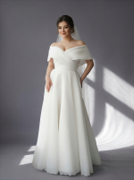 Свадебное платье с пышной, струящейся юбкой макси